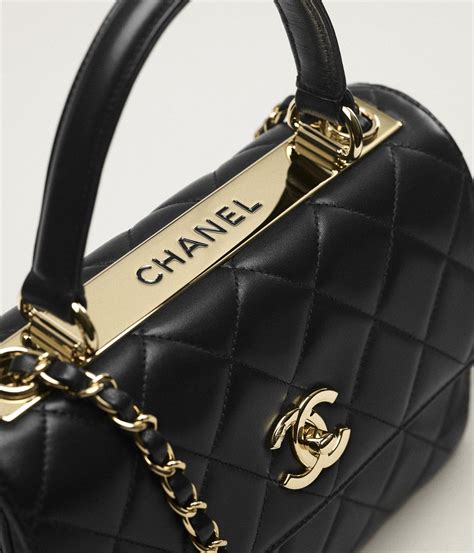 chanel flap bag with top handle gold